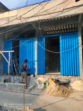 Roling door folding gate