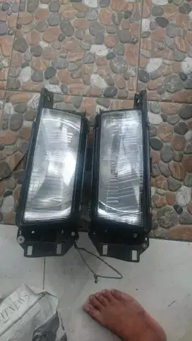 Headlamp original sepasang koito mazda 323 INTERPLAY