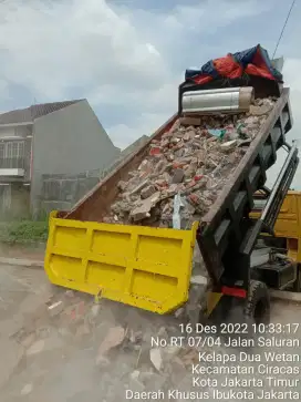 Urug buang puing sampah urugan puing tanah merah campur pengurugan