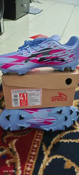 Sepatu bola Specss