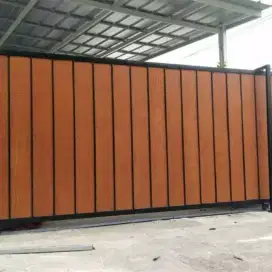 pagar besi motif kayu