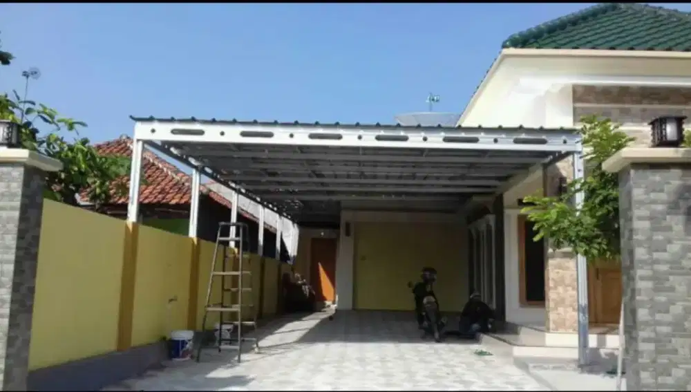 Pemasangan kanopi rumah rangka baja ringan atap spandek pasir