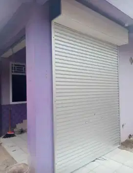 Rolling door folding gate