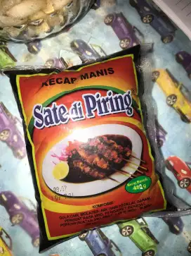 Kecap cap sate dipiring