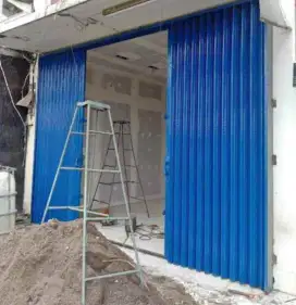 Pintu ruko rolling door follding gate sejebodetabek bergaransi