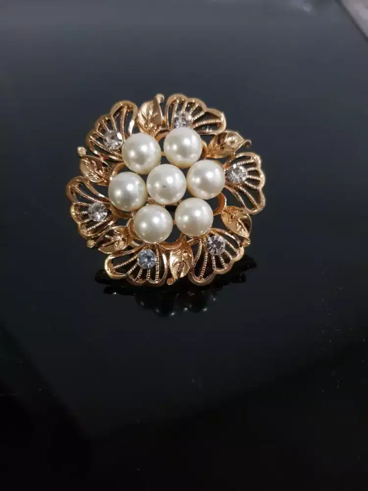 Kepala gesper rok lilit