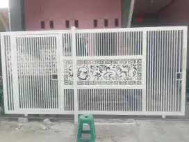Pintu dorong motip kembang coting