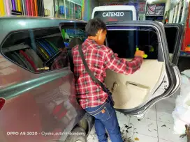 Pasang kaca film panggilan murmer