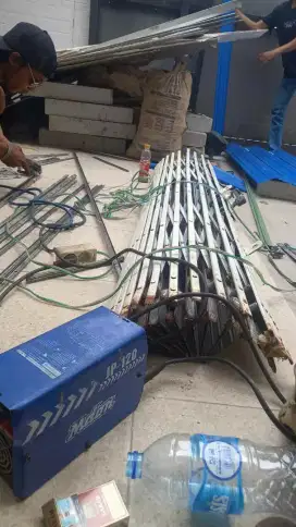 Reparasi service rolling door folding gate murah