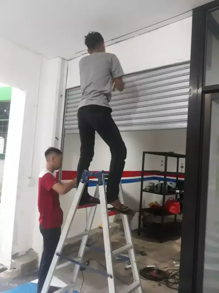 Tukang Perbaikan rolling door murah folding gate pondok klpa