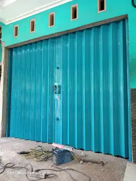 Folding get dan rolling door