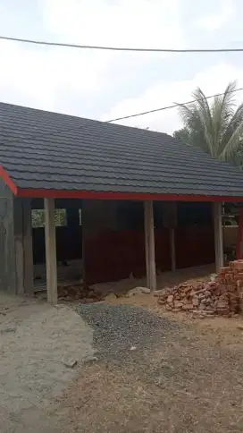 Atap rumah genteng metal pasir
