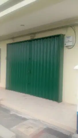 Folding gate rolling door