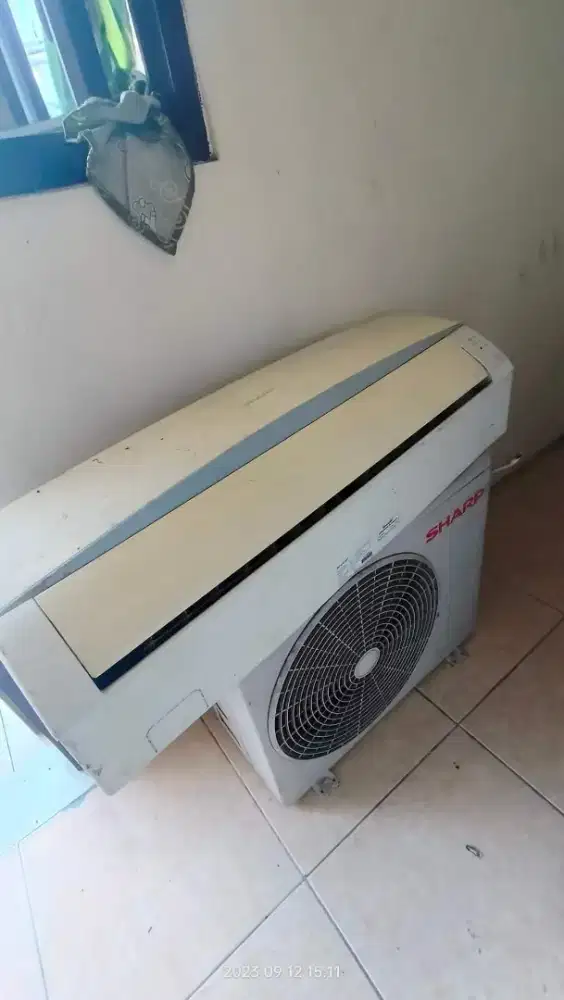 AC merk sharp bekas pemakaian