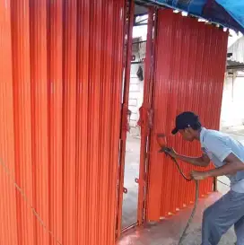 Folding gate roling door