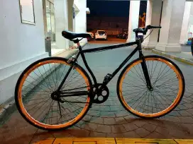 Sepeda fixie rem torpedo