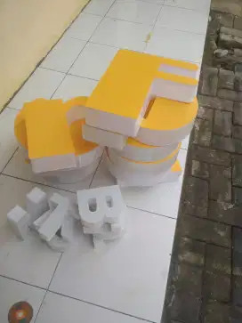 Produksi neon box dan hurup timbul