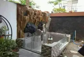 Kolam relief tebing