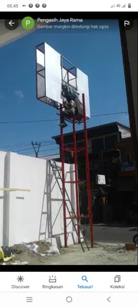 Plang papan nama-pemasangan