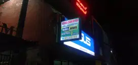 neon box dan papan nama