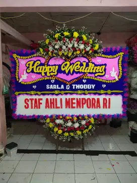 Karangan bunga papan yang pas untuk keperluan duka cita