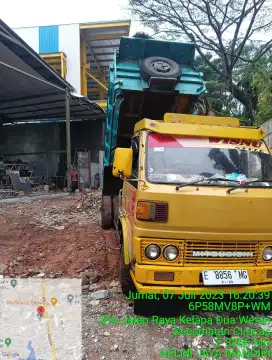 Buang puing sampah urugan puing tanah merah campur pengurugan urug