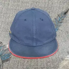 Topi Lacoste Live