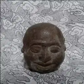 Patung  Muka Budha