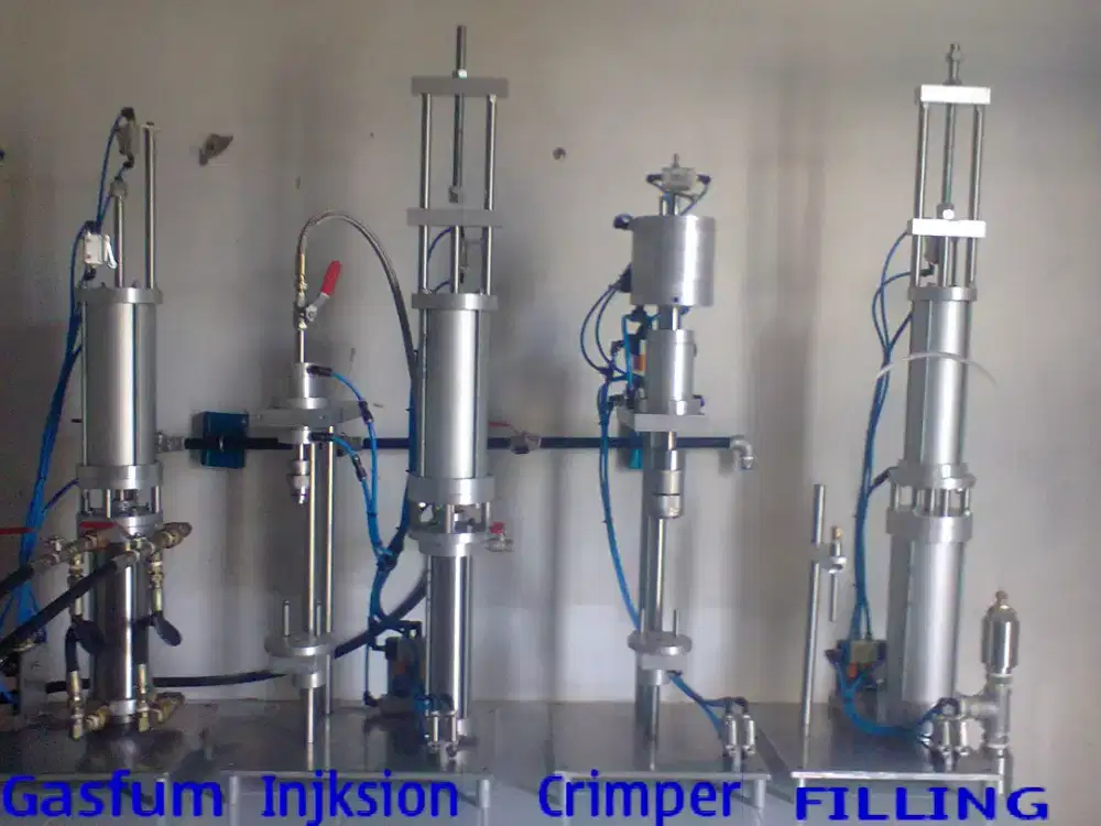 Mesin : FILLING AEROSOL / liquit