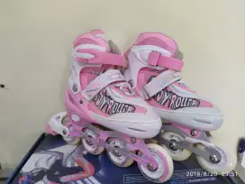 Mengurangi anak dari gadget sepatu roda inline skate