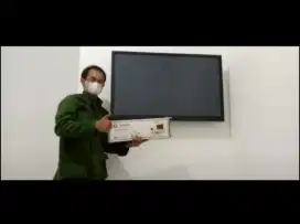 pasang  breket Braket tv