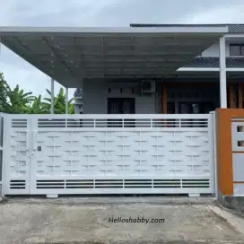 Pagar besi model anyaman