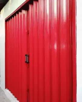 Folding gate roling door