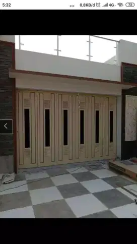 Pintu gerbang garasi ruko