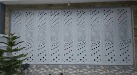 Pintu besi lipat Handerson cantik dengan motif custom ukiran