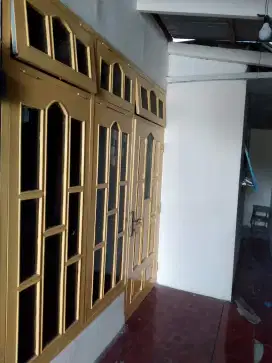 DI KONTRAKAN RUMAH BELAKANG