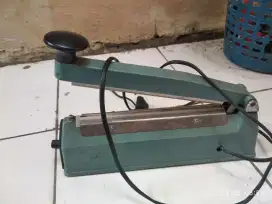 mesin presan plastik