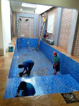 Tukang kolam renang